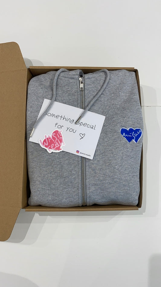 Coffret simple hoodie zippé "change the rules" gris