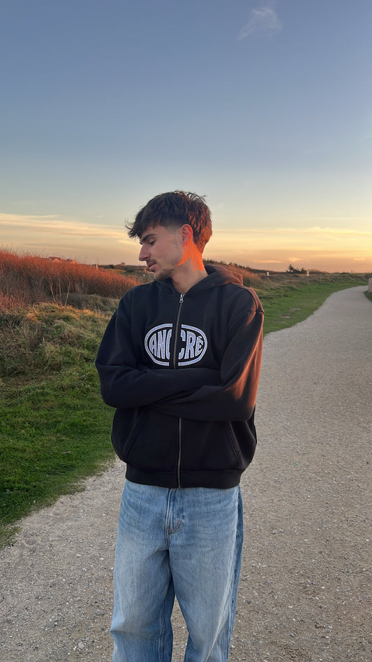 Hoodie zippé brodé « too busy living » noir délavé