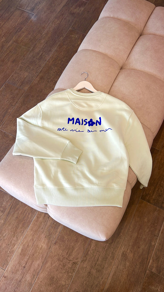 Sweat « maison avec vie sur mer » pastel